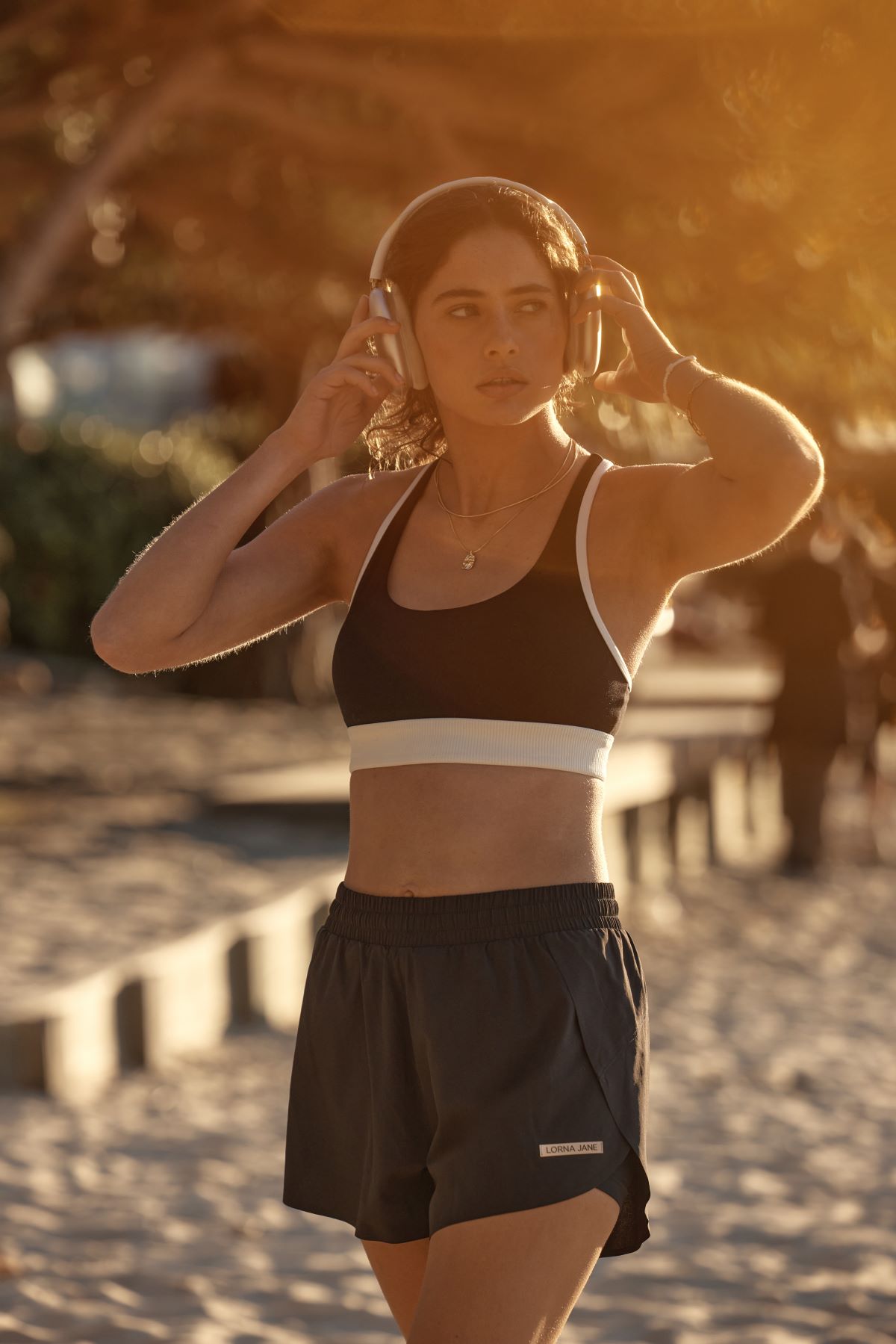 Woman wearing sports bra and shorts