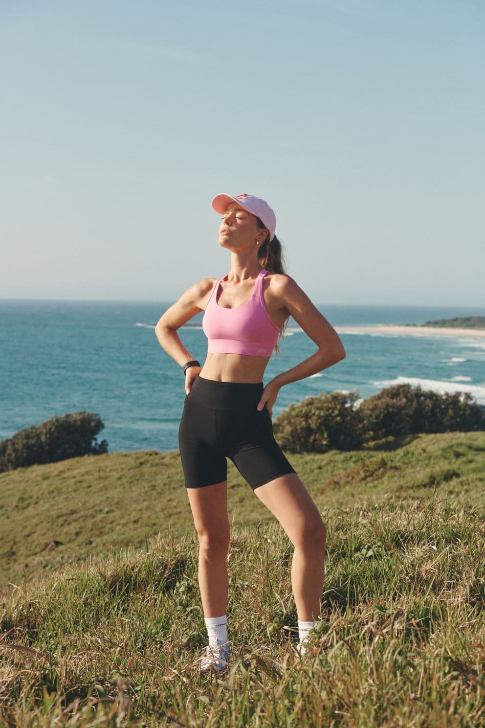 Women wearing Lorna Jane clothing and holding fitness equipment