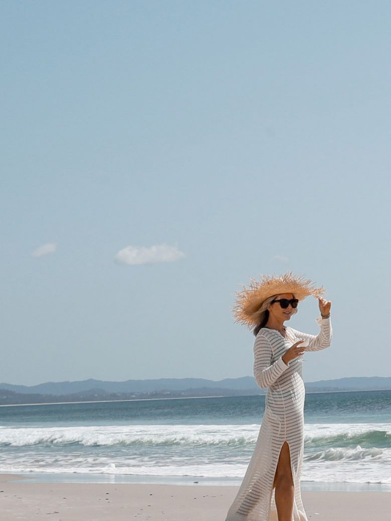 Woman standing on a beach