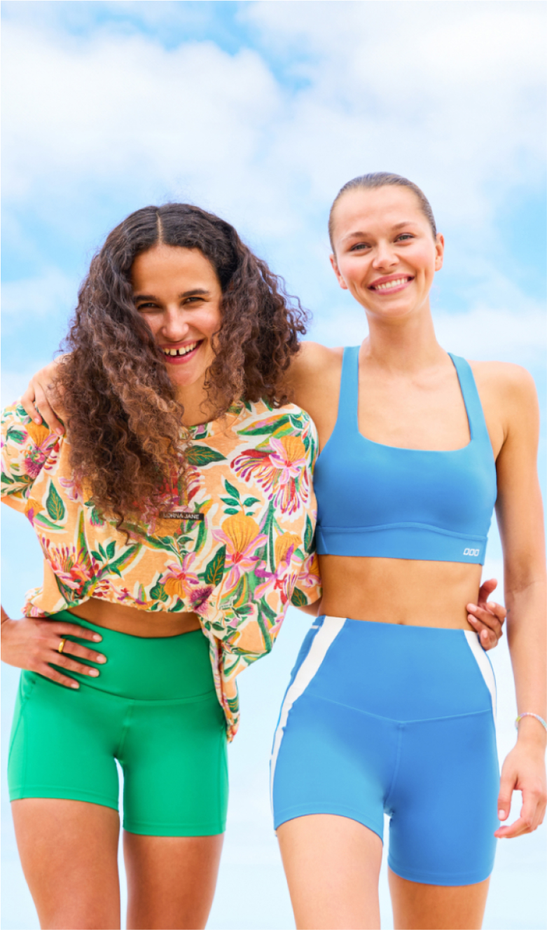 Two women smiling at camera