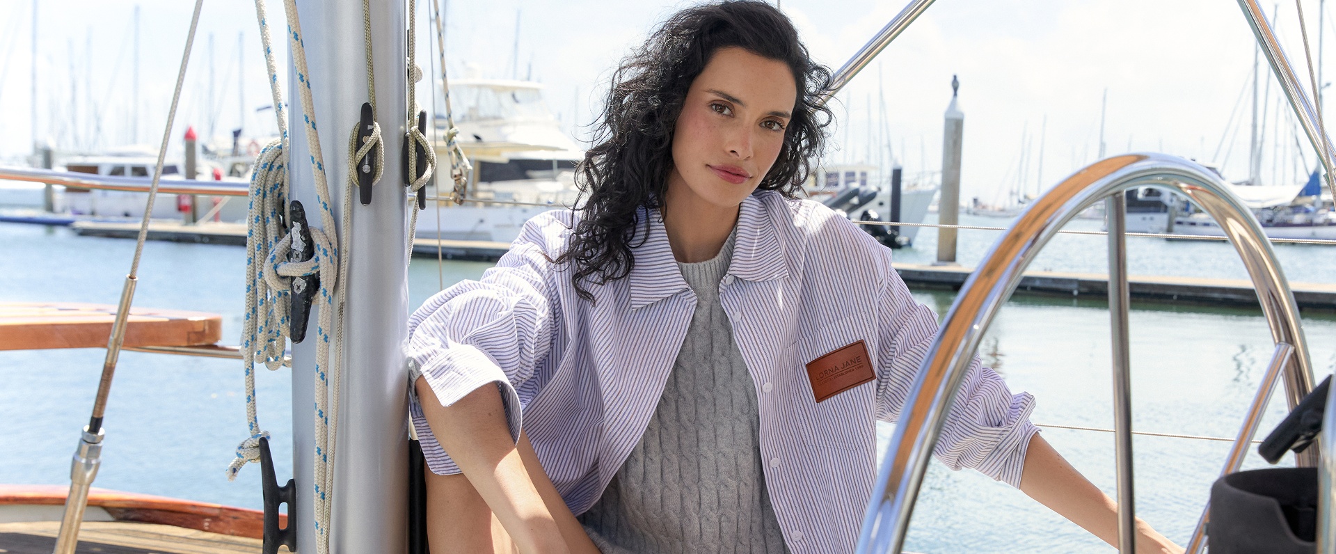 Two women walking on grass