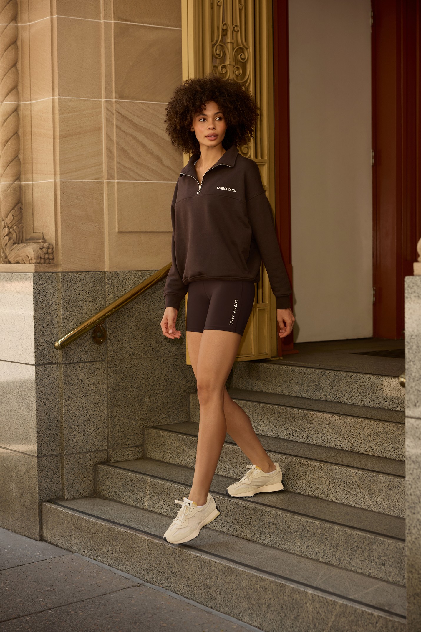 Women in activewear with laptop