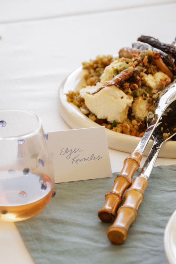 Table placecard with food in background