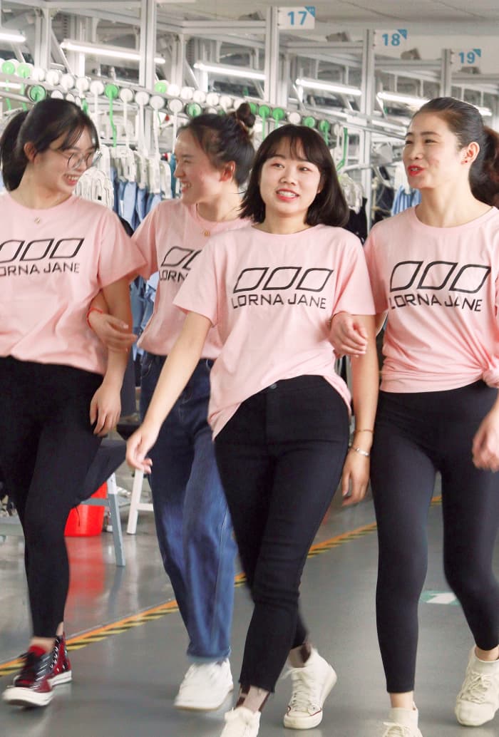 women wearing pink t-shirts with Lorna Jane logo