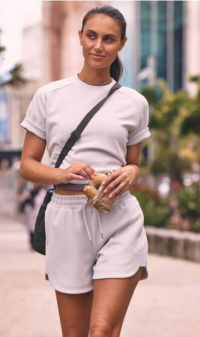 woman eating a bagel