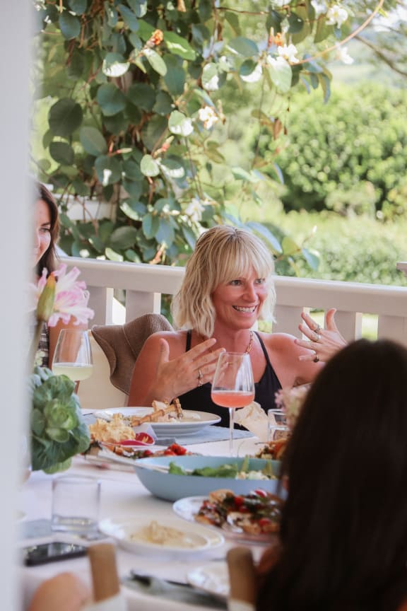 Women talking at a table